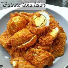 Sensasi pedas dipadukan dengan tekstur telur yang gurih di luar, tapi empuk di dalam, terasa berbeda kunci utama dari resep telur balado adalah cita rasa siraman sambalnya. Resep Balado Tahu Telur Cara Memasak Praktis