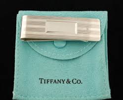 Authentic vintage sterling silver engraved wallet/case. Engine Turned Sterling Silver Tiffany Marked Money Clip With Suede Bag And