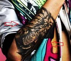 Gorgeous black/grey microphone with a rose. Christina Novelli S 5 Tattoos Their Meanings Body Art Guru