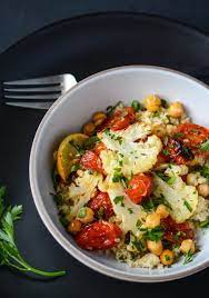 Roasted Cauliflower Tomato And Chickpea Bowl Scaling Back Recipe Vegetarian Recipes Vegetable Recipes Veggie Recipes