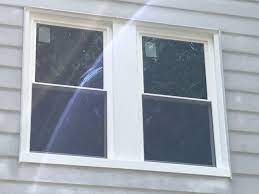 We Installed A Double Vinyl Window With Exterior Capping Inside Aluminum Siding On This Home In Fort Washingt Windows Vinyl Window Installation Window Exterior