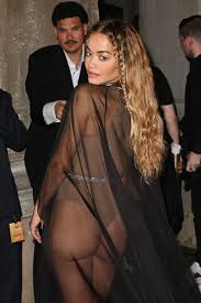 Rita Ora’s peek-a-boo nipple in braless attire