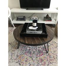 Our round drop leaf table is a versatile, space&#45;saving solution for urban studios and small dining areas. World Market Round Wood Hairpin Coffee Table Aptdeco