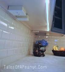 Under the cabinet light fixtures with led bulbs. Building A Home Kitchen Reveal Tales Of A Peanut Under Cabinet Outlets Kitchen Outlets Interior Design Kitchen Small