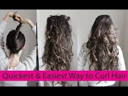 Take a strand of your hair from the side wrap the end around your index finger to create a loop. How To Curl Your Hair Without Heat Or A Curling Iron Lazy Curls For Lazy Days Youtube