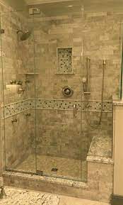 Seats can make showers safer, especially for people with limited mobility. 17 Scrumptious Small Bathroom Remodel Brown Ideas Tile Walk In Shower Bathroom Remodel Shower Marble Shower Tile