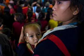 ບັນຍາກາດທີ່ຈຸດພັກເຊົາຊົ່ວຄາດ ຜູ້ປະສົບໄພພິບັດນ້ຳຖ້ວມ ເມືອງສະໜາມໄຊ,  ແຂວງອັດຕະປື, 25 ກໍລະກົດ 2018.