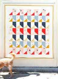 This fast and easy (and free) baby quilt pattern uses my shortcut method for sewing two half square triangles (hst's) at one time. 25 Free Baby Quilt Patterns Tutorials Polka Dot Chair