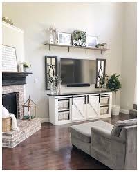This style of decorating practically begs friends and families to come in, put their feet. Living Room Decor Tv Stands Novocom Top