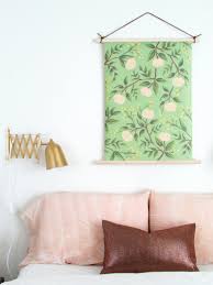 Below is the before and after and a tutorial on how i i would love to have a go at this with some marimekko fabric, quick question, do you by the stretcher frames the exact size of your wall art? 25 Diy Wall Hangings To Refresh Your Decor