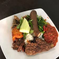 Dulu dia adalah karyawan pecel ayu. Warung Nasi Tempong Mbak Har Indonesian Restaurant