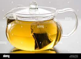 Glass Tea Pot With Herb Tea Bag And Herb Tea Stock Photo Alamy
