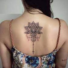 55 Coolest Lotus Tattoos And Ideas With Meanings Tattoos Spine Tattoos Body Art Tattoos