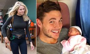 Wimbledon ace Marcus Willis shows off his baby daughter