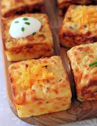 Leftover Mashed Potato Puffs They Re Combined With Eggs Sour Cream Cheese And Chives Then Baked In A Cupcake Pan Until Golden And Food Recipes Chef Recipes