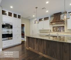 white cabinets with a walnut kitchen
