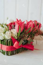 Check spelling or type a new query. Romantic Luxury Flower Arrangement With White Roses Pink Tulips And Eucalipt With Red Ribbon Stock Photo Picture And Royalty Free Image Image 96200408