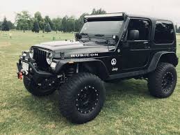 Image result for Brilliant Black 2005 Jeep
