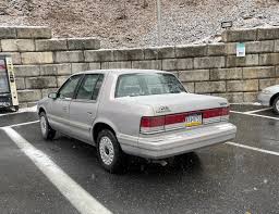 Image result for Medium Driftwood 1994 Chrysler