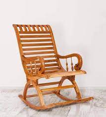 Its angled back and generous size. Buy Teak Wood Rocking Chair In Light Teak Finish By Karigar Online Wooden Rocking Chairs Chairs Furniture Pepperfry Product