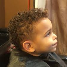 For this cut, the face is a little longer, so adding longer bangs help frame it better. Haircuts Black Baby Boy First Haircuts