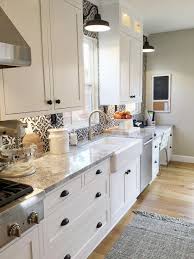 Farmhouse Kitchen Backsplash And Countertop Farmhouse Kitchen With Patterned Tile Small Cottage Kitchen Small Farmhouse Kitchen Farmhouse Kitchen Inspiration