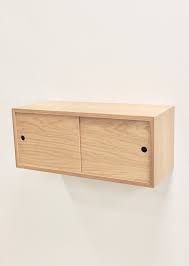 Floating Storage Cabinet With Sliding Doors Handmade In Solid Etsy Sliding Cabinet Doors Floating Cabinets Barn Doors Sliding