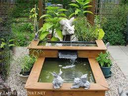 Ponds with waterfalls have many appealing qualities: 20 Beautiful Backyard Pond Ideas For All Budgets