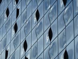 Add some class with a custom glass! Mind Benders 5 Unbelievable Curved Glass Facades