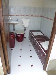 22 bathroom with uddt, urinal, sink