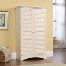 Especially if you combine the cabinets with antique decoration and furniture, such as antique rustic table, ceiling with white ornament and classy ceiling lamp, and other decorations. Sauder Woodworking Sauder White Storage Cabinet 419636 The Home Depot Tall Cabinet Storage Kitchen Cabinet Storage Office Storage Cabinets