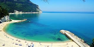Monte conero, dominates the area, looking like it belongs elsewhere, rising up from a coastline that is otherwise completely flat to the north and to. Riviera Del Conero Marken Italien De