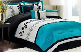A comforter, bed skirt, shams, and three accent pillows, crafted with polyester fabric, are included in this set. Black And Turquoise Bed Set Bedroom Turquoise Teal Bedding Red Bedroom Decor