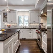 9 kitchens with show stopping backsplash hgtv s decorating. White Kitchen Black Granite Houzz