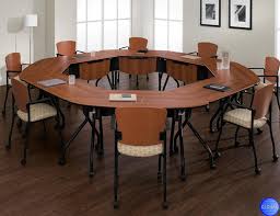 Measuring 12 feet long, this luxurious table seats ten to twelve people. 4 Types Of Conference Tables For The Modern Office Connecting Elements