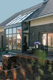 Gemutliche Terrasse Mit Angrenzendem Glaserker Haus Erweiterungen Haus Bauen Lassen Fertighaus Kaufen