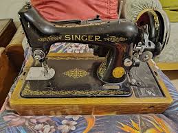 Image result for singer 28k