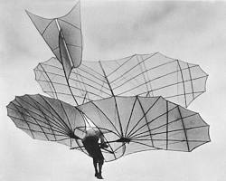 Image of Otto Lilienthal gliding in the 1890s.