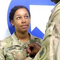 Capt. Sarah Acosta, 391st Fighter Squadron pilot, holds