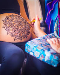The location of a tattoo, and a woman's body type, may cause a tattoo to stretch or change, even if she religiously coats her tummy in cocoa butter and drinks gallons of water every day. Pin On Henna