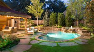 Swimming pools with organic shapes like this one are great if you try to create a simple yet interesting design for your backyard. 15 Amazing Backyard Pool Ideas Home Design Lover