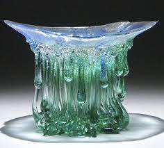 Jellyfish Glass Tables With Dripping Tentacles That Look Like They Ve Been Created By The Sea Glass Artwork Broken Glass Art Glass Art