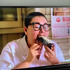 I'm watching She-Devil. Ruth persuades uptight straightlaced Hooper with  some pastries and then she lets loose 😈😈 Behold. The power of cannoli.