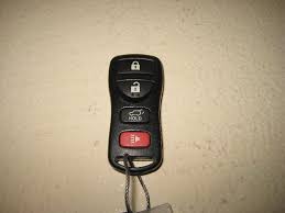Battery and door key inside the key fob. Nissan Armada Key Fob Battery Replacement Guide 001 Nissan Armada Key Fob Armada