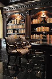 High End Styling In A Masculine Study With Custom Built In Cabinetry Mediterranean Homes Home Library Home Library Design
