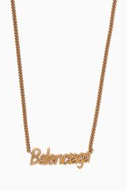 This logo was introduced when tom made his debut. Shop Balenciaga Gold Type Logo Necklace For Women Ounass Uae Womens Necklaces Balenciaga Necklace