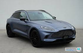 Image result for Concours Blue 2021 Aston Martin