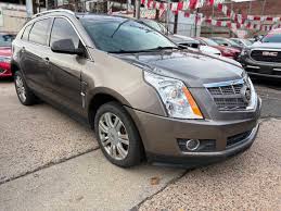 Image result for Mocha Steel 2011 Cadillac