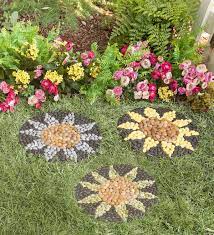 The sunflower stepping stones are three sunflower stepping stones with many petals and a large centre. Sunflower Stepping Stones Set Of 3 Plowhearth