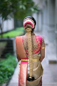 Right from the wedding function to a casual one, this hairstyle will make you fall in love with its centralized segmented theme. Best South Indian Bridal Hairstyles Wedmegood